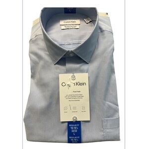 Calvin Klein Men's Light Blue Dress Shirt. Machine wash stretch wrinkle free.